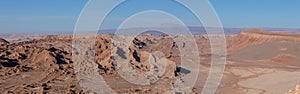 Panorama of the red rock and salt formations of the Valle de la Luna, Valley of the Moon, in the Atacama Desert.