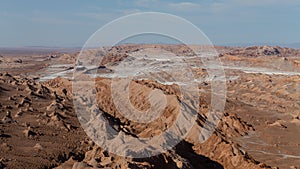 A panorama of the red rock and salt formations of the Valle de la Luna, Valley of the Moon, in the Atacama Desert, Chile