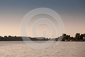 Panorama of the reka Sava river between belgrade and obrenovac, in Serbia, with a couple of splav, serbian raft floating houses,