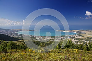 Panorama of the resort city of Gelendzhik from the top of the Markoth ridge. You can see the round Gelendzhik Bay, the Black sea