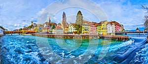 Panorama of Reuss river and Needle Dam with medeival houses and Spreuerbrucke bridge in Lucerne, Switzerland