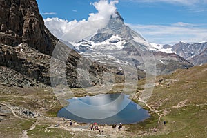 Panorama of Riffelsee lake and Matterhorn mountain in national park Zermatt