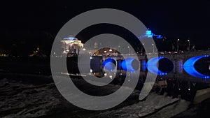 panorama of the river Po in Turin with illuminated bridge by night