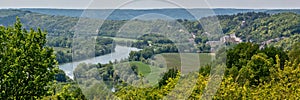 Panorama of the river Seine and the castle of La Roche Guyon in Vexin regional national park, Val d`Oise, Ile de France photo