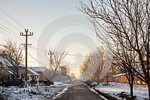 Panorama of a road and street in the village of crepaja, in Vojvodina, Banat, Serbia, in the countryside, during a cold freezing