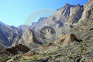 Panorama of the rocky mountains with unidirectional fractures, Wadi Bani Awf, Al Rustaq, South Batinah Governorate of Oman photo