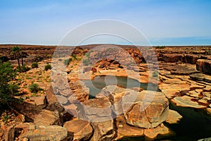 Panorama of rocky pond on Adrar plateau Mauritania