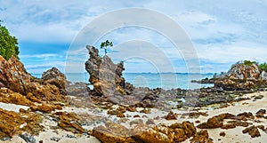 Panorama of the rocky shore, Khai Nok island, Phuket, Thailand