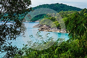 Panorama of rocky shoreline, sea and tropical island nature