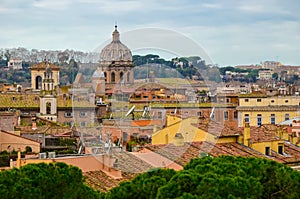 Panorama of Rome city with ancient buildings and trees