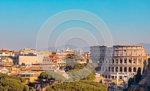 Panorama Rome Italy, sunset city Colosseum ruins Roman Forum from square of Venice