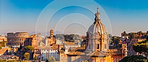 Panorama Rome Italy, sunset city Colosseum ruins Roman Forum from square of Venice