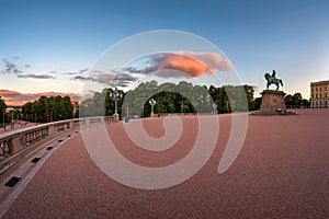 Panorama of the Royal Palace Sqaure and Statue of King Karl Johan in the Evening, Oslo, Norway photo