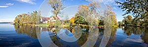 Panorama scenic coast at the confluence of the Trubezh river into lake Pleshcheyevo. Autumn. Pereslavl-Zalessky. Russia.