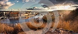 Panorama on scenic view of bridges on the Vltava river and historical center of Prague, buildings and landmarks of old town, durin