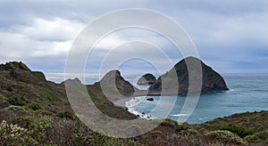 Panorama of sea stacks at Sisters Rock State Park on the Pacific coast in Oregon, USA