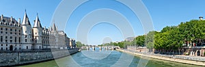 Panorama of Seine river with conciergerie and pont neuf - Paris