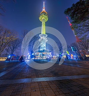 Panorama Seoul city at Night and Namsan Tower or N Seoul Tower stands tall on the top of Namsan Mountain, South Korea