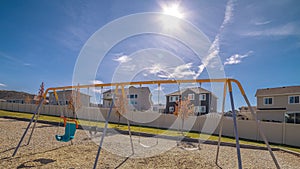 Panorama Set of A-frame swings on a kids playground