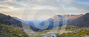 Panorama shot of golden hour in Spanish Pyrenees on Carros de Foc hiking trail photo