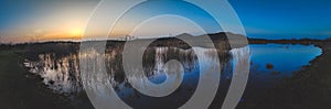 Panorama shot of lake and terril photo