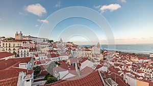 Panorama showing aerial view of Alfama in Lisbon timelapse during sunset.