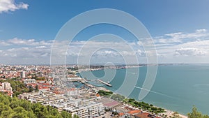 Panorama showing aerial view of marina and city center timelapse in Setubal, Portugal. photo