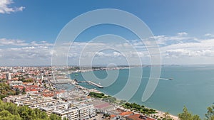 Panorama showing aerial view of marina and city center timelapse in Setubal, Portugal. photo