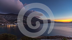 Panorama showing Amorgos island aerial day to night timelapse from above. Greece