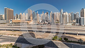 Panorama showing Dubai Marina skyscrapers and Sheikh Zayed road with metro railway, United Arab Emirates