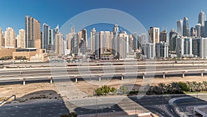 Panorama showing Dubai Marina skyscrapers and Sheikh Zayed road with metro railway, United Arab Emirates