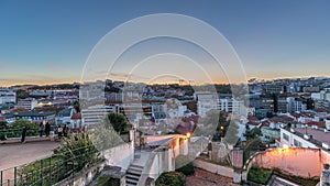 Panorama showing Jardim do Torel day to night timelapse with views to the city center of Lisbon after sunset. Portugal