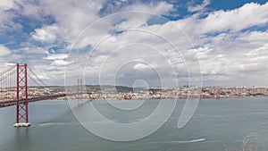 Panorama showing Lisbon cityscape and Tagus river timelapse with 25 of April bridge