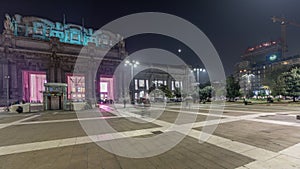 Panorama showing Milano Centrale night timelapse - the main central railway station of the city of Milan in Italy.