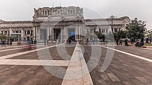 Panorama showing Milano Centrale timelapse - the main central railway station of the city of Milan in Italy.