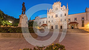 Panorama showing Sa da Bandeira Square with a view of the Santarem See Cathedral day to night timelapse. Portugal photo