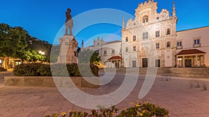 Panorama showing Sa da Bandeira Square with a view of the Santarem See Cathedral day to night timelapse. Portugal