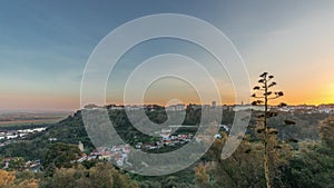 Panorama showing sunset over the Castle of Almourol on hill in Santarem aerial timelapse. Portugal photo