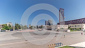 Panorama showing traffic on the Deshmoret e Kombit Boulevard in Tirana timelapse.