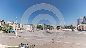 Panorama showing traffic on the Deshmoret e Kombit Boulevard in Tirana timelapse.