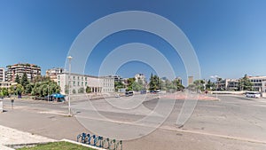 Panorama showing traffic on the Deshmoret e Kombit Boulevard in Tirana timelapse.