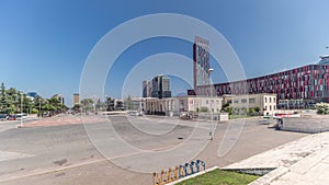 Panorama showing traffic on the Deshmoret e Kombit Boulevard in Tirana timelapse. photo