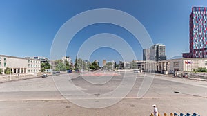 Panorama showing traffic on the Deshmoret e Kombit Boulevard in Tirana timelapse. photo