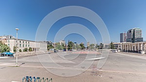 Panorama showing traffic on the Deshmoret e Kombit Boulevard in Tirana timelapse. photo