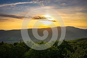 Panorama of the Silesian Beskids from Rownica peak at sunrise. Poland