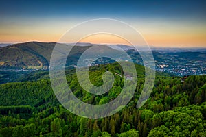 Panorama of the Silesian Beskids from Rownica peak at sunrise. Poland