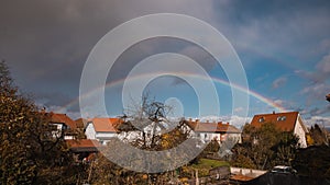 Panorama of siska district in Ljubljana, Slovenia accompanied by beautiful rainbow spanning over the horison over the Smarna Gora