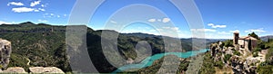 panorama of Siurana church, canyon river and blue sky