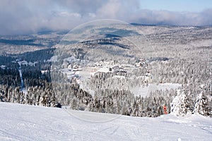 Panorama of ski resort Kopaonik, Serbia, mountains view, houses covered with snow