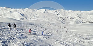 Panorama of skiers on a ski slope, the Alps France. Winter sports web banner
